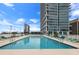 Enjoy the rooftop pool with views of the city from the sundeck and building with highrise at 150 E Robinson St # 407, Orlando, FL 32801