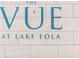 Close up of The Vue at Lake Eola sign on a light stone brick wall at 150 E Robinson St # 407, Orlando, FL 32801