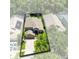 Surveyed aerial view of a beautiful property surrounded by lush greenery, showcases the home's boundaries at 1617 Song Sparrow Ct, Sanford, FL 32773