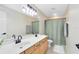 Elegant bathroom with double sinks, spacious countertop, and contemporary fixtures at 1617 Song Sparrow Ct, Sanford, FL 32773