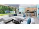 Open living space with kitchen and backyard views at 1617 Song Sparrow Ct, Sanford, FL 32773