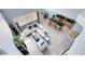 Open-concept living area with white furniture, a modern kitchen, and lots of natural light at 1617 Song Sparrow Ct, Sanford, FL 32773