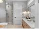 Luxurious bathroom with a soaking tub, walk-in shower, and stylish double vanity at 1780 Mizell Ave., Winter Park, FL 32789