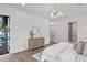 Stylish bedroom with access to the pool and neutral decor at 1780 Mizell Ave., Winter Park, FL 32789