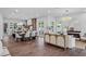 Bright and open-concept living space with hardwood floors and modern fireplace at 1780 Mizell Ave., Winter Park, FL 32789
