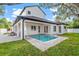 Charming backyard pool and patio area with ample outdoor space at 1780 Mizell Ave., Winter Park, FL 32789