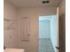 The laundry room includes a closet and connections for both your washer and dryer at 1950 Birnham Wood Bnd, Kissimmee, FL 34746