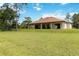 Expansive backyard with lush green grass, ideal for outdoor activities and relaxation at 19606 Reynolds Pkwy, Orlando, FL 32833