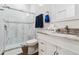 A bathroom offering a glass-enclosed shower with decorative tile, providing a spa-like experience at 19606 Reynolds Pkwy, Orlando, FL 32833
