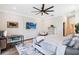 A spacious bedroom with a ceiling fan, an accent wall, and a desk area for a productive workspace at 19606 Reynolds Pkwy, Orlando, FL 32833