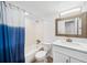 Bathroom has a shower-tub combo with a modern vanity and a framed mirror above the sink at 200 St Andrews Blvd # 601, Winter Park, FL 32792