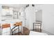 Charming kitchen features a breakfast bar and a view into the dining area at 200 St Andrews Blvd # 601, Winter Park, FL 32792