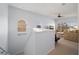 Open concept living room with large windows offering ample natural light and a comfortable seating area at 20130 Sunset Landing Ave, Groveland, FL 34736