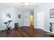 Bonus room with exercise equipment and wood-look floors at 203 Brookgreen Way, Deland, FL 32724