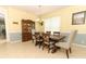 Spacious dining room with modern decor, tile flooring, and plenty of natural light at 203 Brookgreen Way, Deland, FL 32724