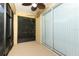 Enclosed lanai with a ceiling fan and sliding glass doors to the exterior at 203 Brookgreen Way, Deland, FL 32724