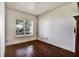 Spare bedroom with wood floors and a large window allowing for ample natural light at 205 Trail Bridge Ct, Winter Garden, FL 34787