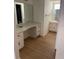 Bathroom vanity featuring matching cabinets and an undermount sink at 229 Doverwood Rd, Fern Park, FL 32730