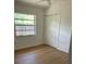 Bedroom featuring closet space and natural light from the window at 229 Doverwood Rd, Fern Park, FL 32730