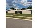 Inviting single-story home with horizontal windows and a neatly landscaped front yard at 229 Doverwood Rd, Fern Park, FL 32730