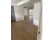 Open living room featuring wood floors and neutral color palette creating a warm and inviting atmosphere at 229 Doverwood Rd, Fern Park, FL 32730