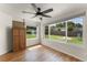 Bonus room features updated ceiling fan fixture, and large windows at 2538 Meadowview Ln, Deland, FL 32720