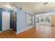 Spacious living room with gleaming hardwood floors and natural light at 2538 Meadowview Ln, Deland, FL 32720