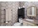 Chic powder room featuring patterned wallpaper, elegant vanity, and stylish fixtures for a sophisticated look at 25554 Hawks Run Ln, Sorrento, FL 32776
