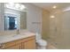Clean bathroom with a glass enclosed shower and single vanity at 260 S Osceola Ave # 902, Orlando, FL 32801