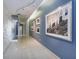 Stylish hallway with modern lighting and decorative artwork, creating an inviting ambiance at 260 S Osceola Ave # 902, Orlando, FL 32801