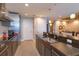 Stylish kitchen featuring granite countertops, stainless steel appliances, and modern fixtures at 260 S Osceola Ave # 902, Orlando, FL 32801