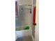Modern bathroom with tiled shower and tub combo and neutral colors at 2833 Woodruff Dr, Orlando, FL 32837