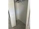 A closet featuring a shelf for storage and white folding doors at 2833 Woodruff Dr, Orlando, FL 32837