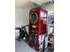 Stacked washer and dryer in the garage at 2833 Woodruff Dr, Orlando, FL 32837