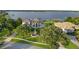 Majestic home featuring lush landscaping, a water fountain, and stunning curb appeal at 2937 Butler Bay N Dr, Windermere, FL 34786