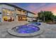 Stunning backyard with sparkling pool and spa against a backdrop of a beautiful home at 2937 Butler Bay N Dr, Windermere, FL 34786