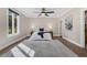 Bedroom featuring stylish decor and large windows for ample natural light at 2937 Butler Bay N Dr, Windermere, FL 34786