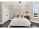 Bedroom with beautiful floors and view of the front yard at 2937 Butler Bay N Dr, Windermere, FL 34786