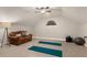 Large bonus room with vaulted ceiling is ideal for exercise or relaxation at 2937 Butler Bay N Dr, Windermere, FL 34786