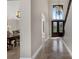 Inviting foyer showcasing a stylish chandelier and staircase at 2937 Butler Bay N Dr, Windermere, FL 34786