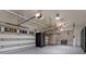 Spacious garage with ample storage space and a roll-up door at 2937 Butler Bay N Dr, Windermere, FL 34786