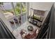 Living room with fireplace, lake views, comfortable seating and backyard patio at 2937 Butler Bay N Dr, Windermere, FL 34786