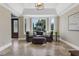 Inviting living room featuring a bay window with great natural light and a comfortable seating arrangement at 2937 Butler Bay N Dr, Windermere, FL 34786