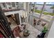 High angle view of the living room, showing the lake view, fireplace, and seating at 2937 Butler Bay N Dr, Windermere, FL 34786