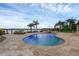Luxury backyard with pool, spa, and lake view providing the ultimate retreat at 2937 Butler Bay N Dr, Windermere, FL 34786