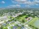 Overhead neighborhood shot with landscaped lawns, indicating convenient community with nearby amenities and city view at 3010 Brandywine Dr, Orlando, FL 32806