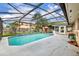 Inviting screened-in pool with ample deck space, perfect for relaxation and outdoor entertaining at 3010 Brandywine Dr, Orlando, FL 32806
