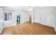Spacious bedroom featuring wood floors, a ceiling fan, and an ensuite bath at 311 Cortland Ave, Winter Park, FL 32789