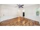 Bedroom with wood floors and a view of an ensuite bathroom at 311 Cortland Ave, Winter Park, FL 32789