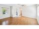 Bright living room featuring hardwood floors, neutral walls, and natural lighting at 311 Cortland Ave, Winter Park, FL 32789
